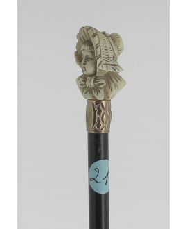 Ivory handle cane, young lady  with  wide-brimmed hat.