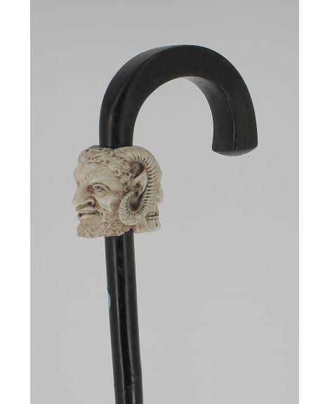 Ivory janus crooked handle with a satyre on one side and a skull on the opposite side, Ebony