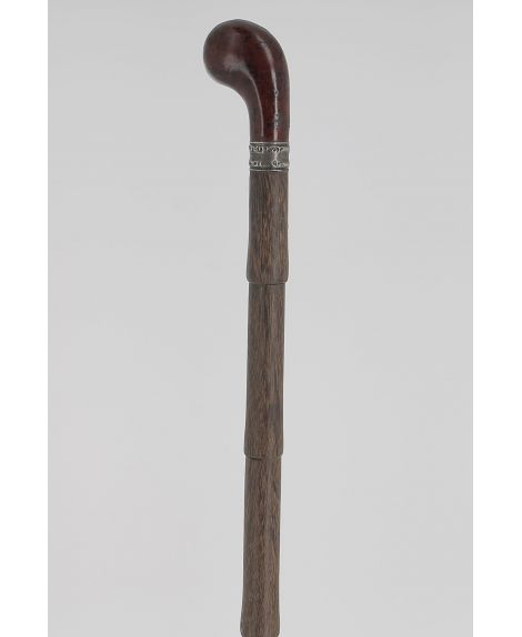 Light cane containing candle, matches and a key