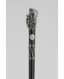 Erotic cane. Devil and but on the head