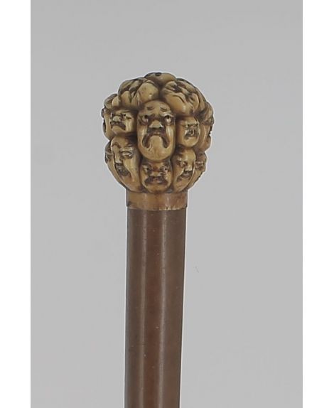 Japanese Ivory knob with multiple faces from Nô. Beginning of 19th century