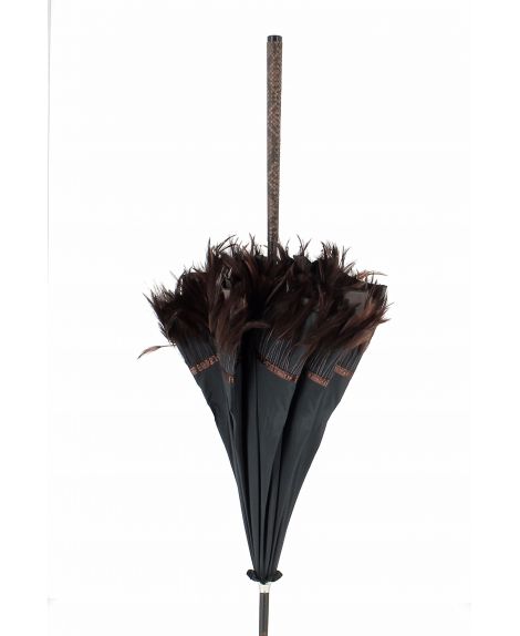 Sun umbrella with feather. Macassar wood shaft. Handle covered with python